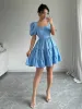 Bow-Back Tiered Ruffle Mini Dress sold by Charming Charlie