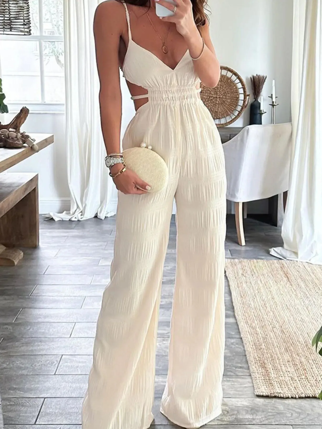 Cut-Out Wide Leg Jumpsuit sold by Charming Charlie