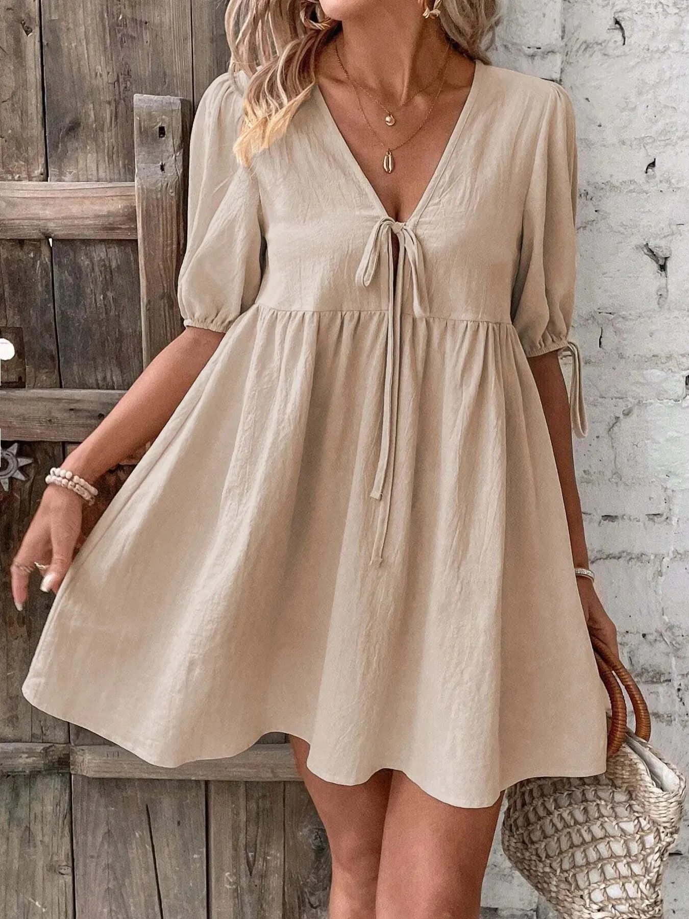 V-Neck Tie-Front Mini Dress with Puff Sleeves sold by Charming Charlie