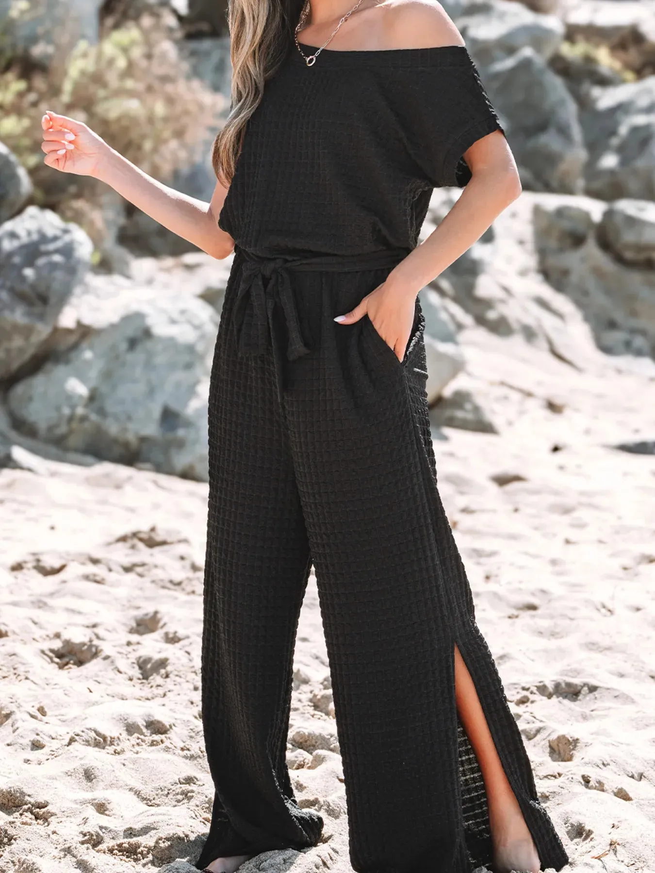 One Shoulder Short Sleeve Knotted Waist Jumpsuit sold by Charming Charlie product image thumbnail 2