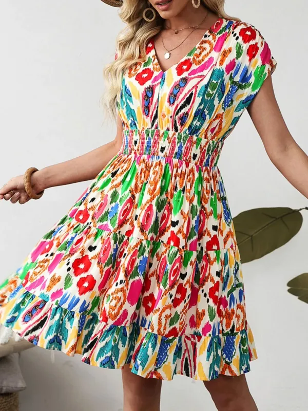 Abstract Print V Neck Dolman Sleeve Ruffle Tiered Mini Dress sold by Charming Charlie