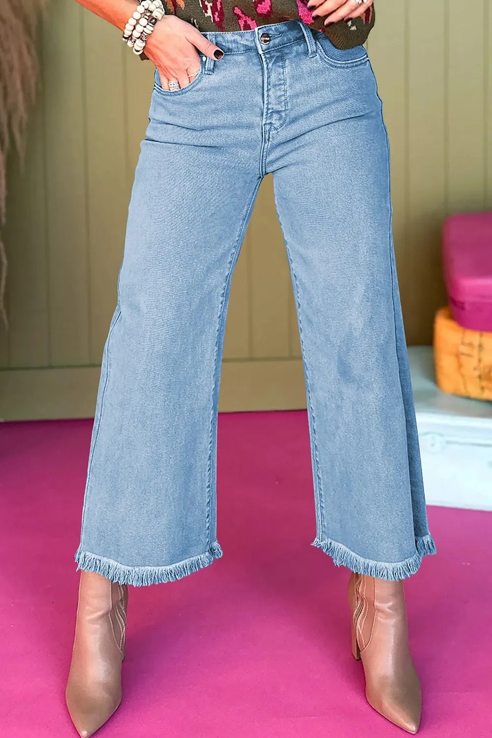 High-Waisted Wide Leg Frayed Hem Jeans sold by Charming Charlie