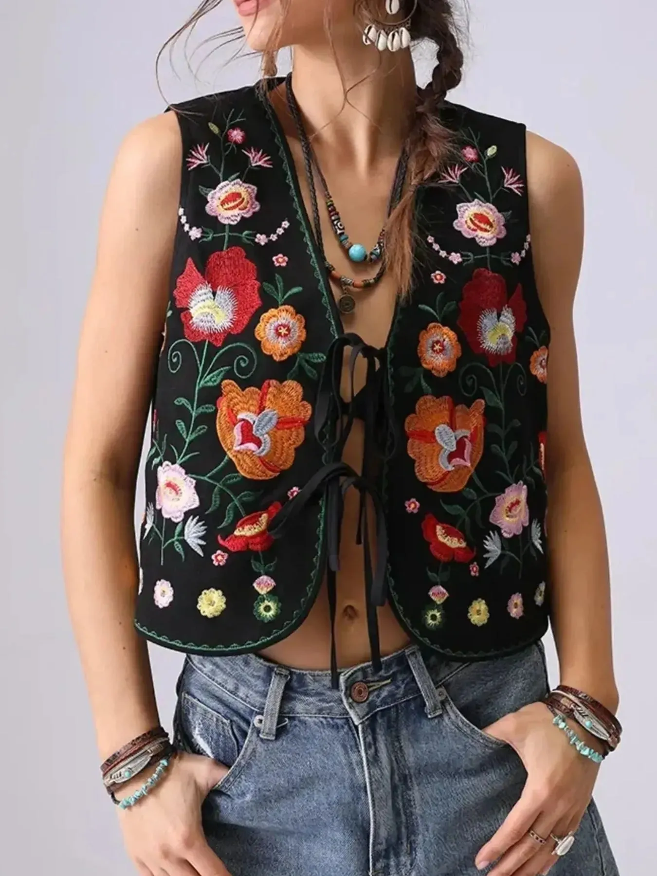 Floral Embroidered Lace-Up Vest sold by Charming Charlie