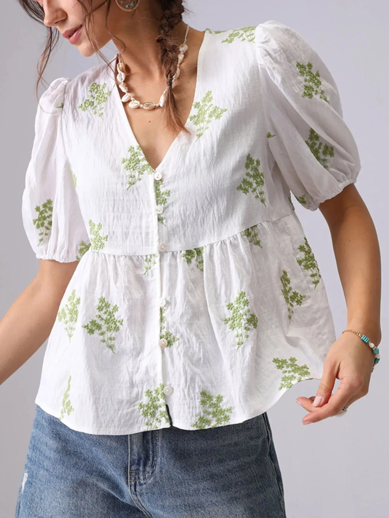 Embroidered V-Neck Puff Sleeve Peplum Blouse sold by Charming Charlie product image thumbnail 5