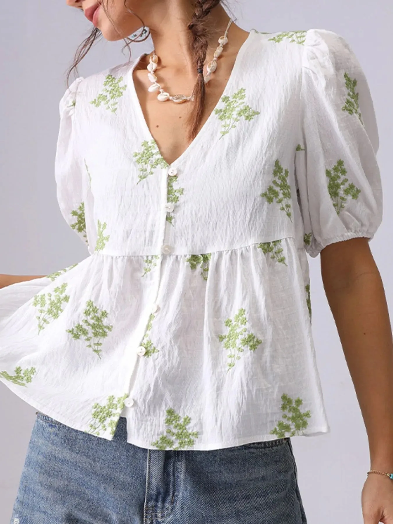 Embroidered V-Neck Puff Sleeve Peplum Blouse sold by Charming Charlie product image thumbnail 4