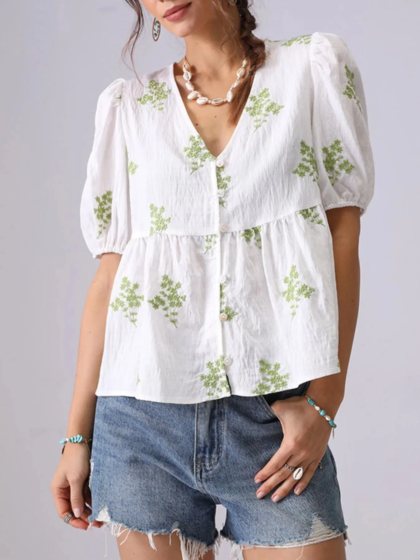 Embroidered V-Neck Puff Sleeve Peplum Blouse sold by Charming Charlie product image thumbnail 3