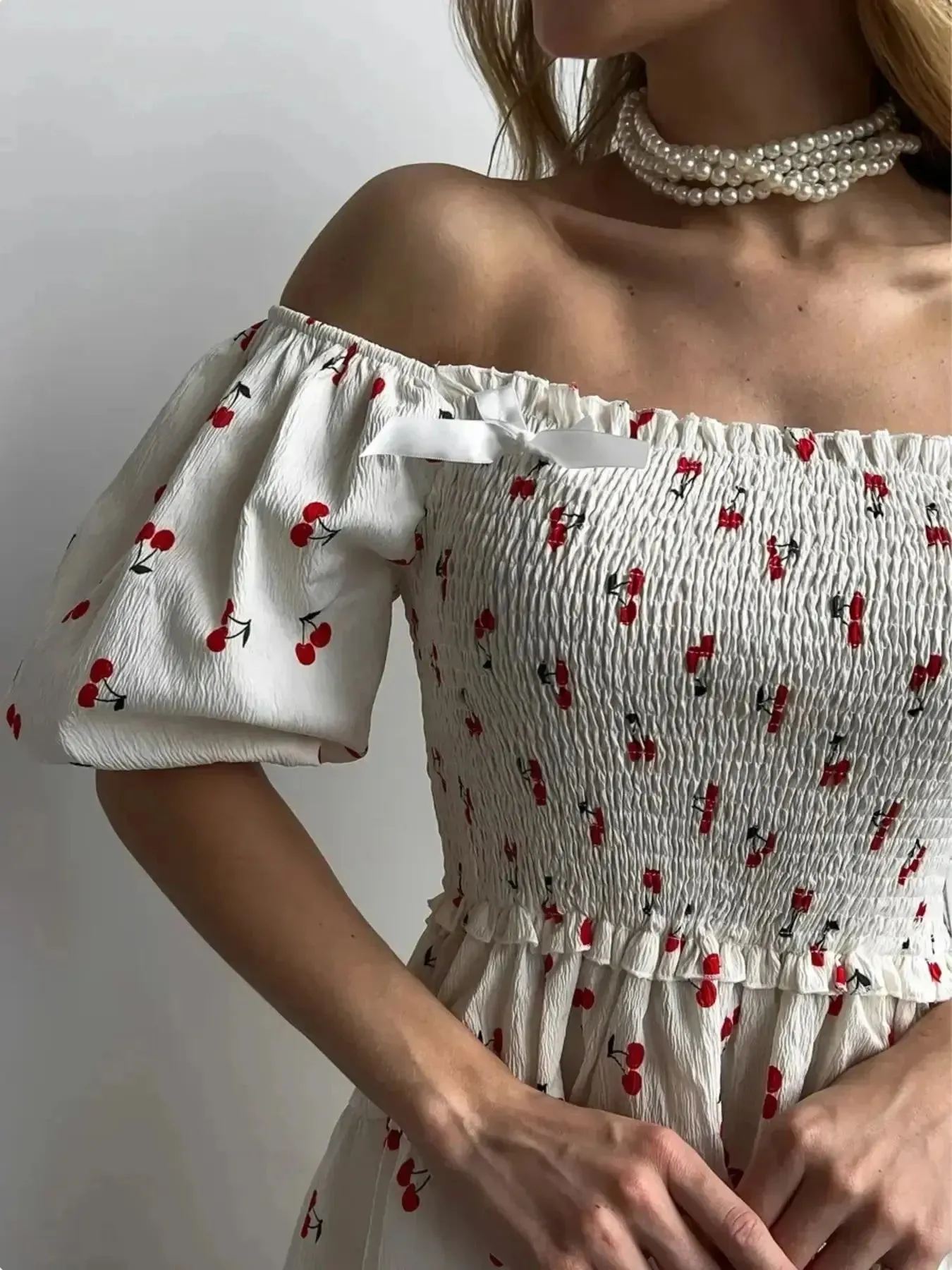 Puff Sleeve Cherry Print Smocked Mini Dress sold by Charming Charlie product image thumbnail 5