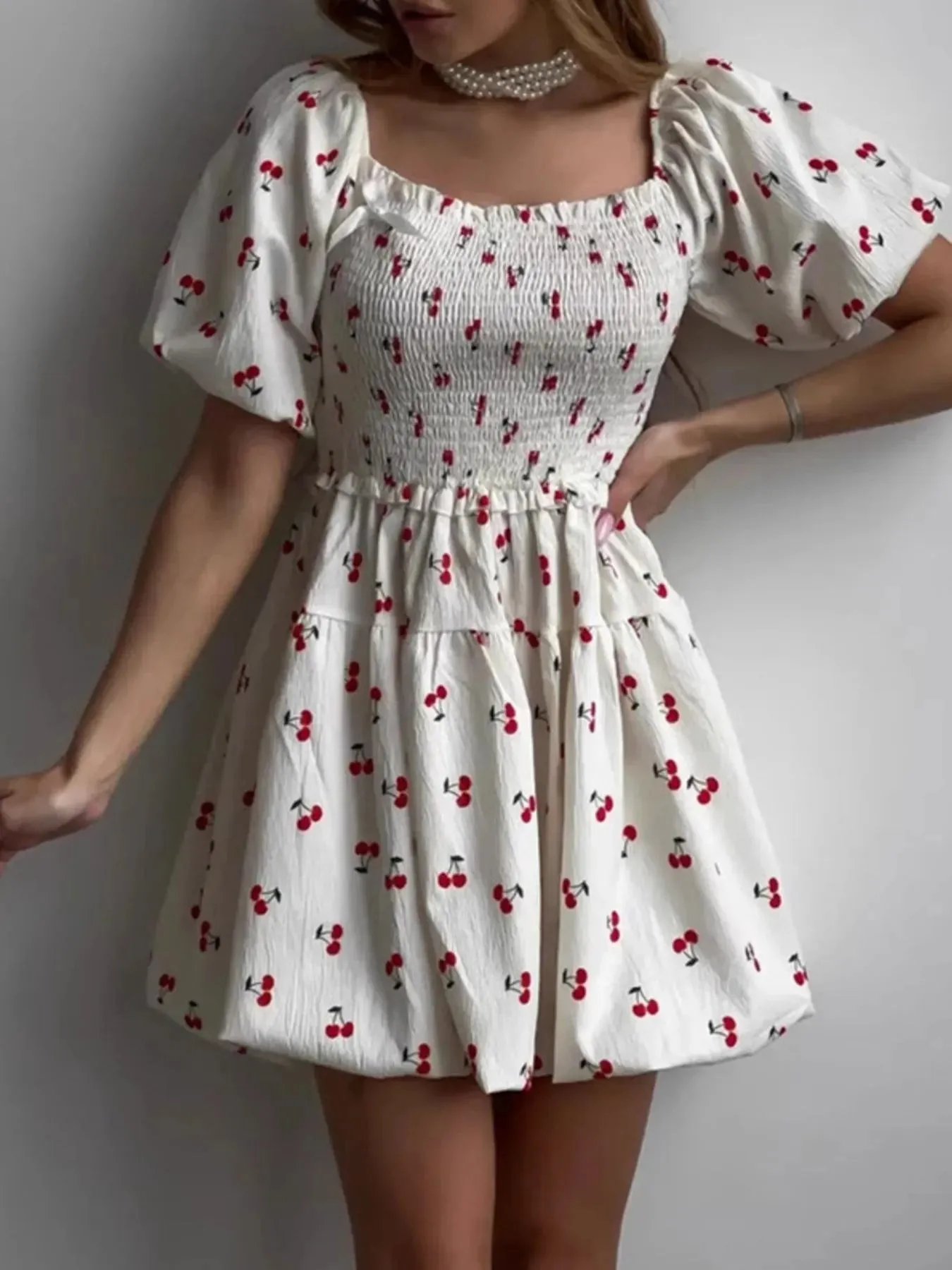 Puff Sleeve Cherry Print Smocked Mini Dress sold by Charming Charlie product image thumbnail 3