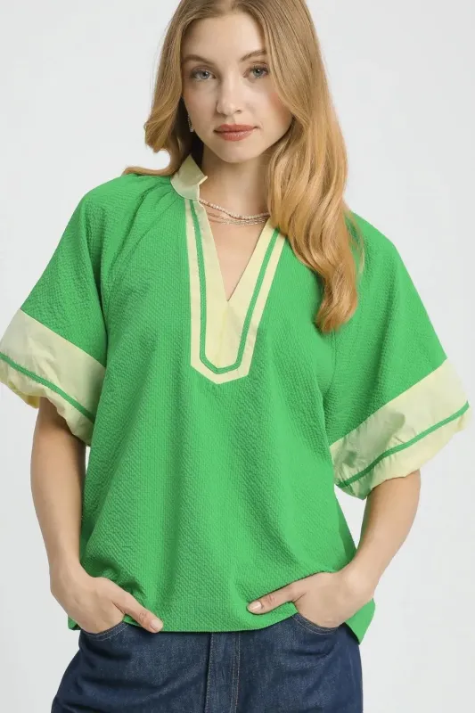 Umgee Contrast Trim Notched Puff Sleeve Blouse sold by Charming Charlie