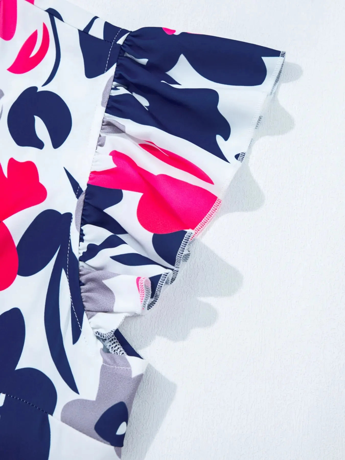 Printed Notched Neck Flutter Sleeve Mini Dress sold by Charming Charlie product image thumbnail 5