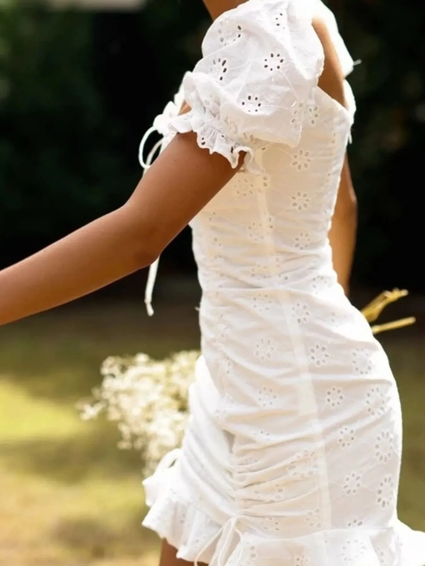 Eyelet Ruffled Hem Lace Up Mini Dress sold by Charming Charlie product image thumbnail 4