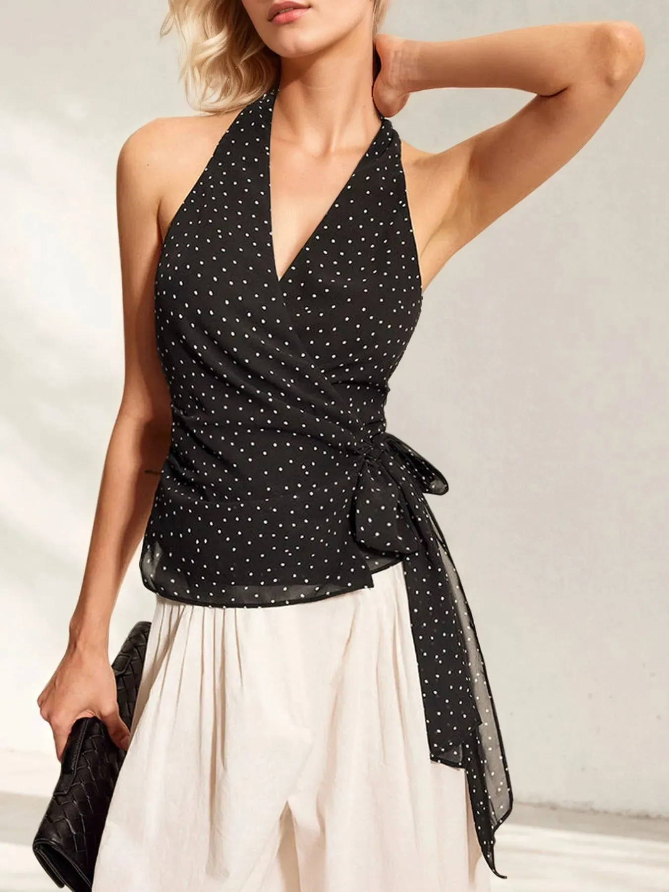 Polka Dot Halter Wrap Cami Top sold by Charming Charlie