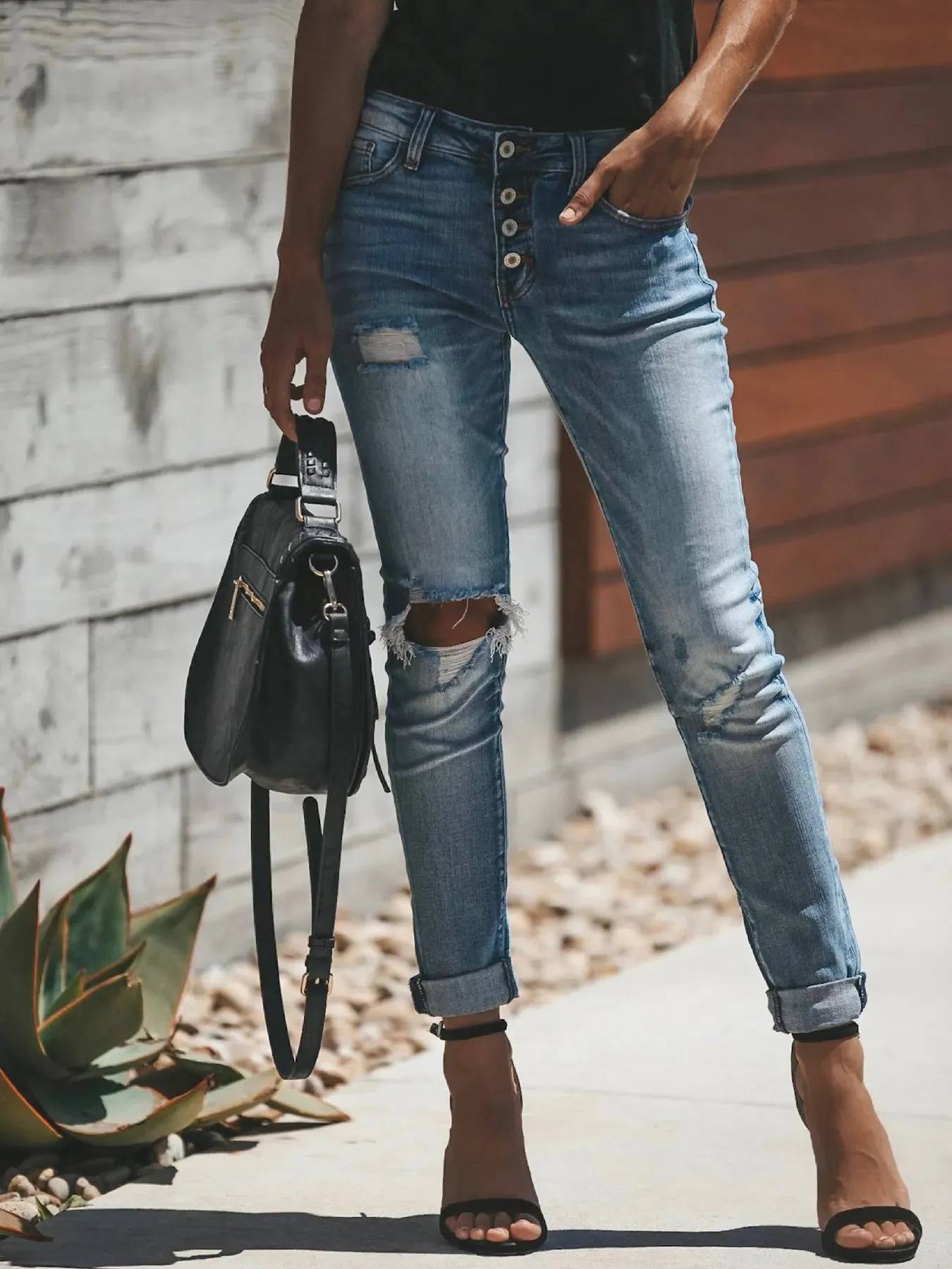 Distressed Button-Fly Skinny Jeans sold by Charming Charlie