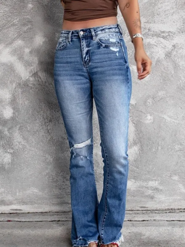 Distressed Flare Jeans sold by Charming Charlie
