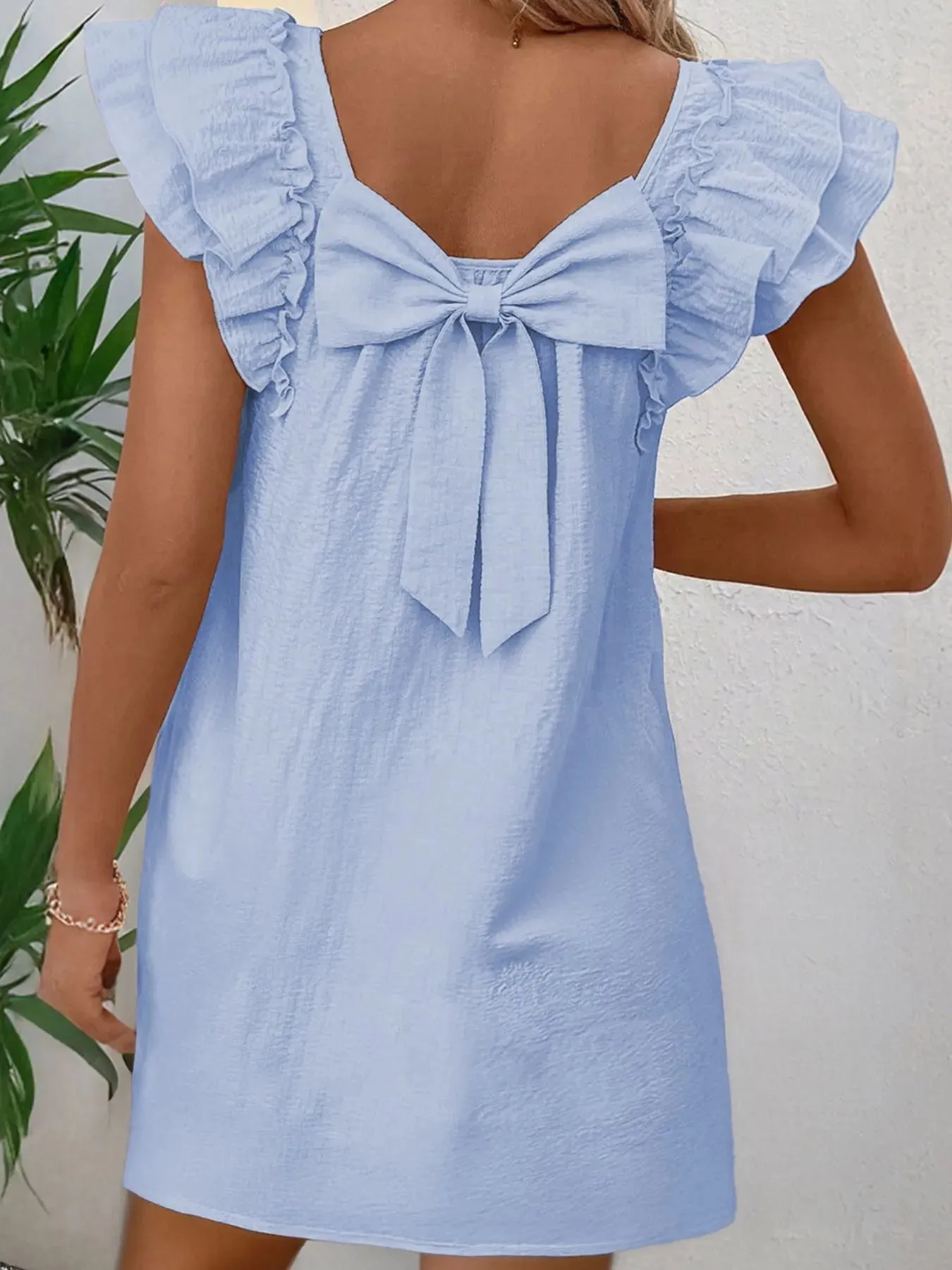Bow Back Ruffled Sleeve Dress sold by Charming Charlie
