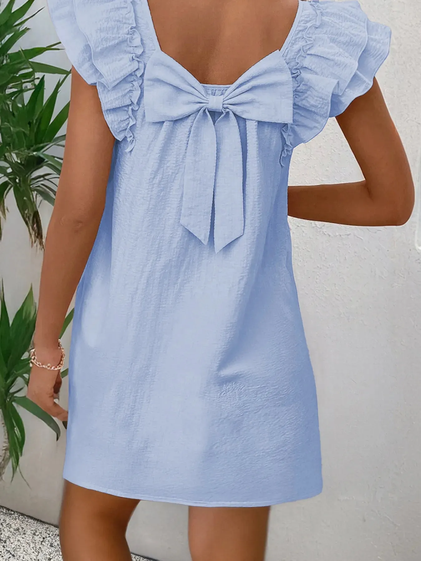 Bow Back Ruffled Sleeve Dress sold by Charming Charlie product image thumbnail 3