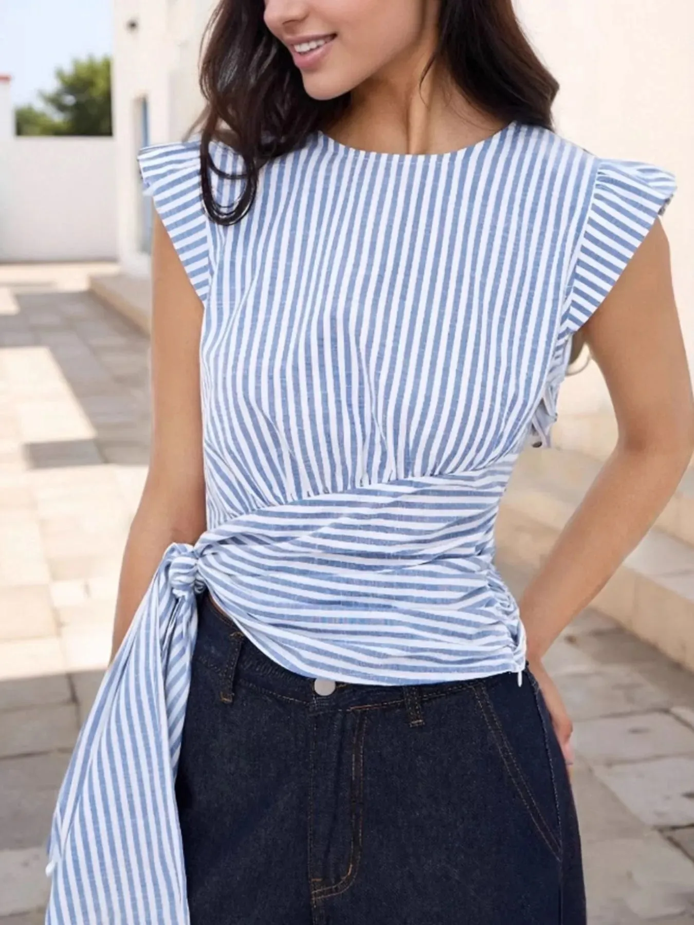Striped Tied Cap Sleeve Blouse sold by Charming Charlie