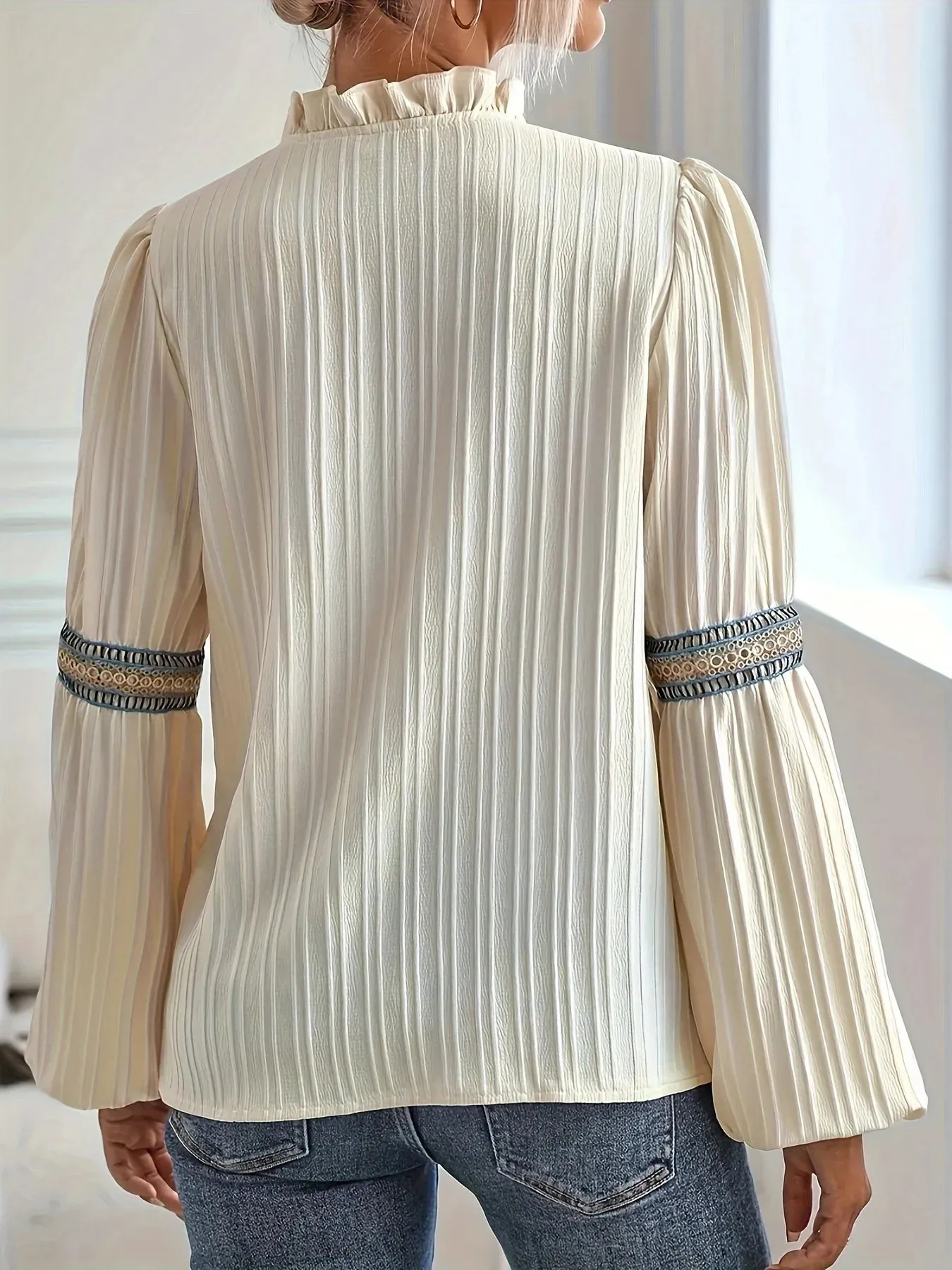 Notched Textured Balloon Sleeve Blouse sold by Charming Charlie product image thumbnail 4