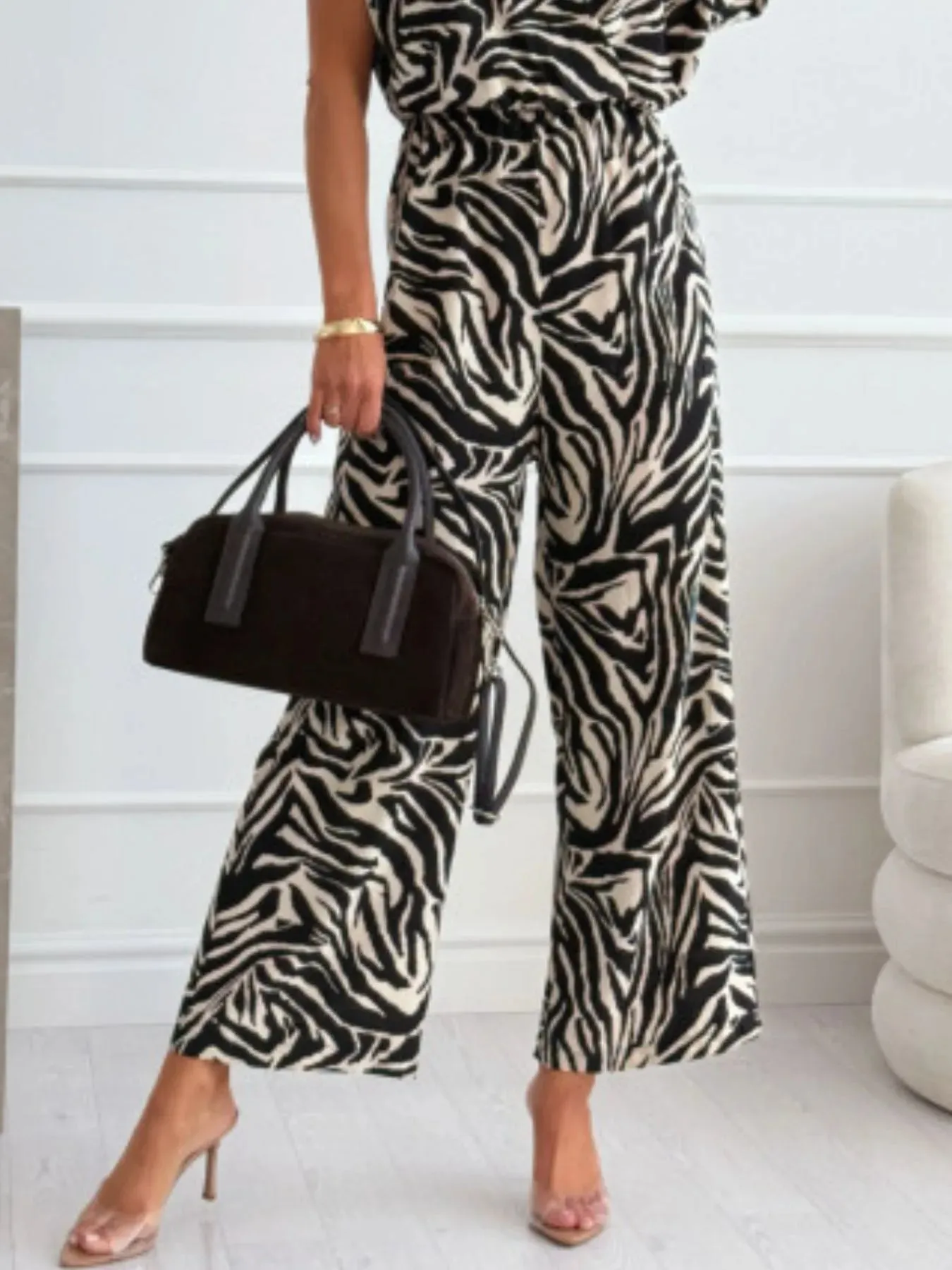 Animal Print Wide Leg Jumpsuit sold by Charming Charlie product image thumbnail 3