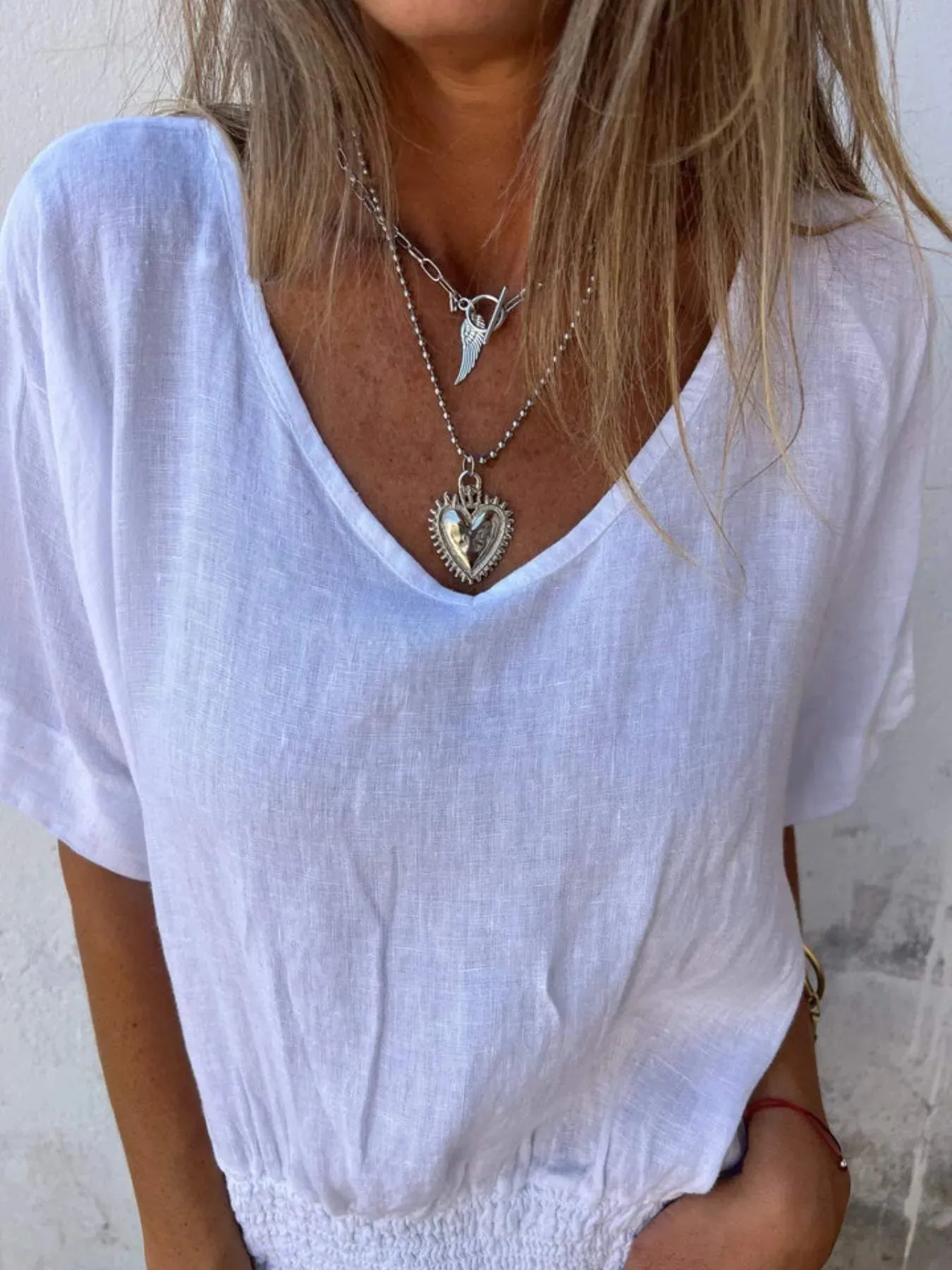 Full Size Smocked Hem V-Neck Relaxed Fit T-Shirt Plus Size sold by Charming Charlie product image thumbnail 2