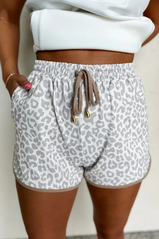 Leopard Elastic Waist Lace up Contrast Trim Shorts sold by Charming Charlie
