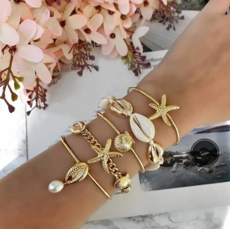 Gold Sea Shell Summer Bangle Bracelet Set sold by Charming Charlie
