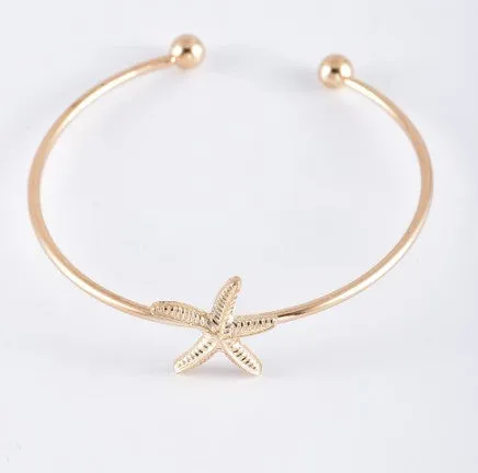 Gold Sea Shell Summer Bangle Bracelet Set sold by Charming Charlie product image thumbnail 2