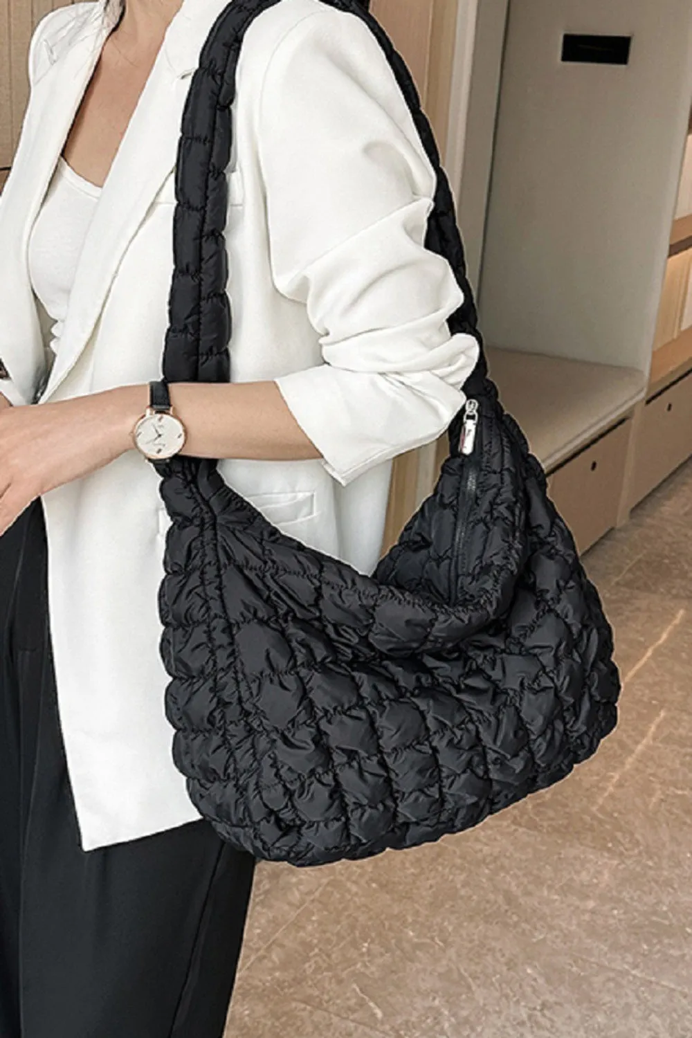 Zenana Puff Quilted Crossbody Bag sold by Charming Charlie