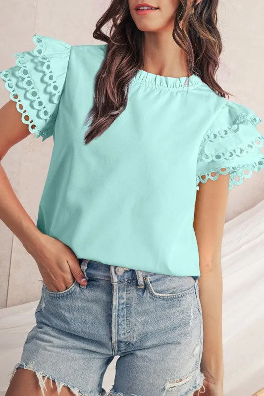 cotton mint ruffle layered blouse sold by Charming Charlie