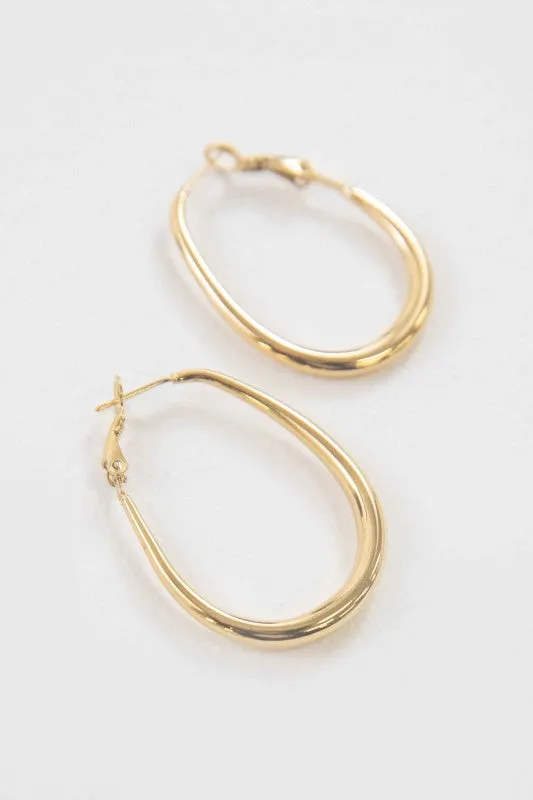 Oro Hoop Earrings | Gold sold by Charming Charlie