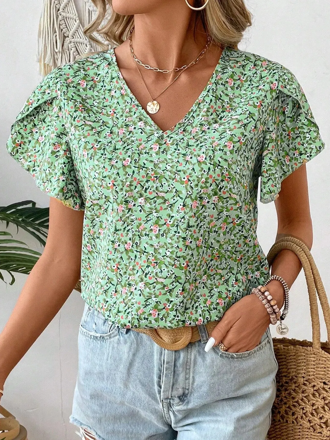 Floral Print V-Neck Short Sleeve Blouse sold by Charming Charlie