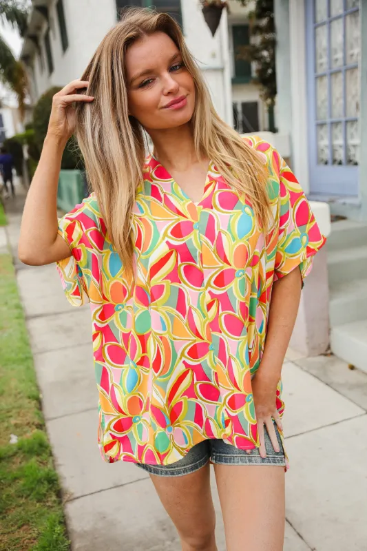 Casual Chic Multicolor Abstract V Neck Dolman Sleeve Top sold by Charming Charlie
