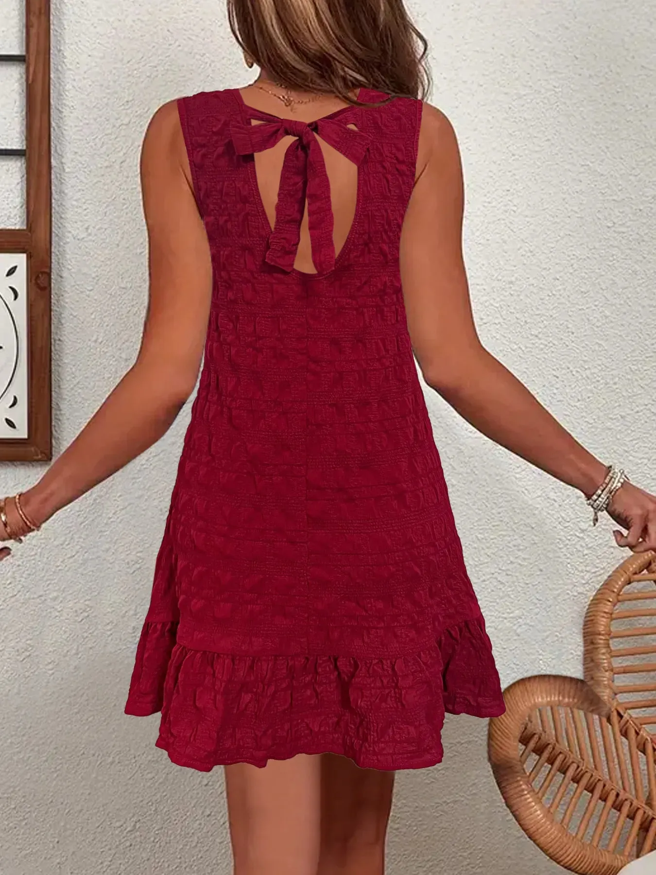 Ruffled Hem Sleeveless Mini Dress sold by Charming Charlie
