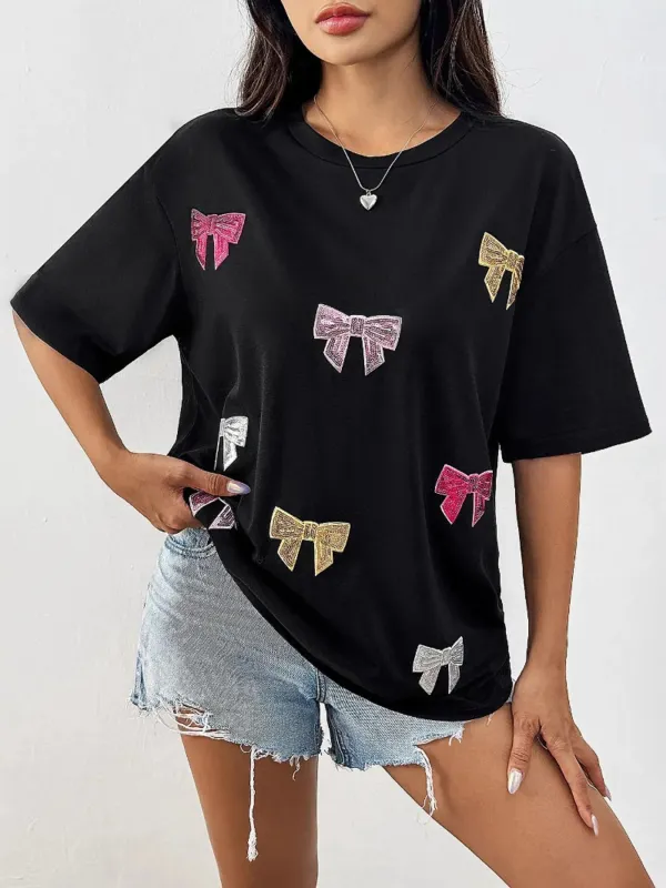 Sequin Bow Round Neck Short Sleeve T-Shirt sold by Charming Charlie