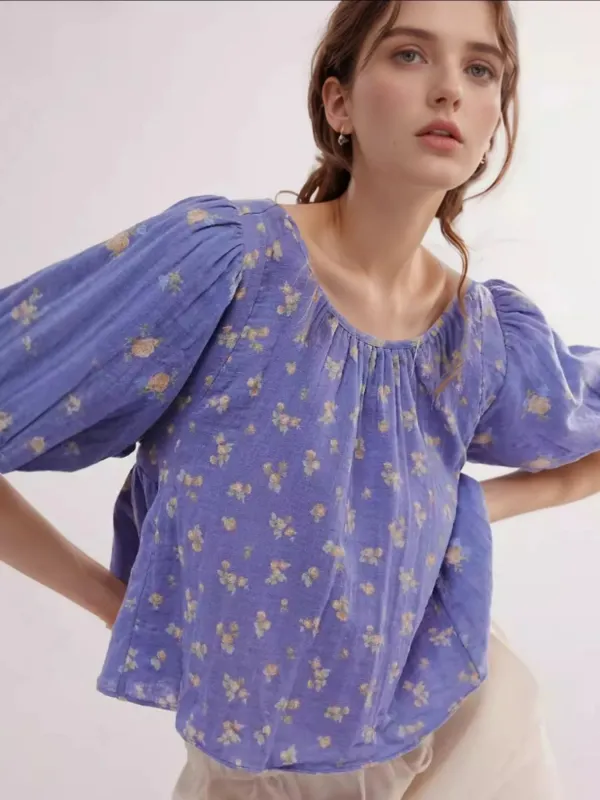 Bow Back Puff Sleeve Blouse sold by Charming Charlie
