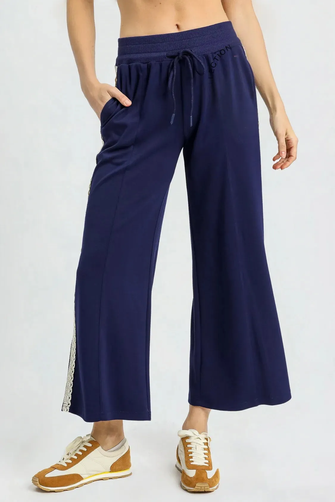 Umgee Wide-Leg Pants with Lace Trim sold by Charming Charlie