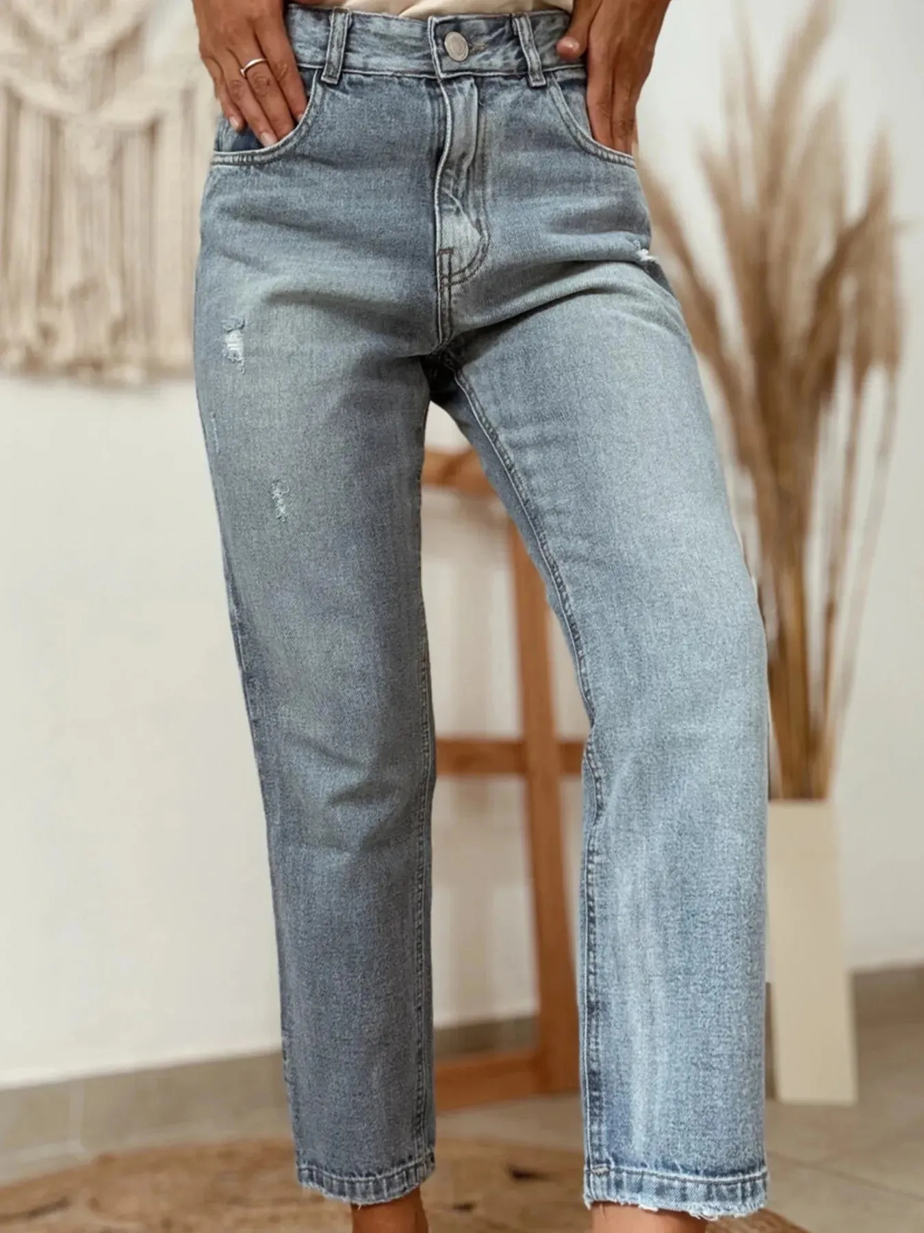 Distressed Ankle-length Straight Jeans sold by Charming Charlie