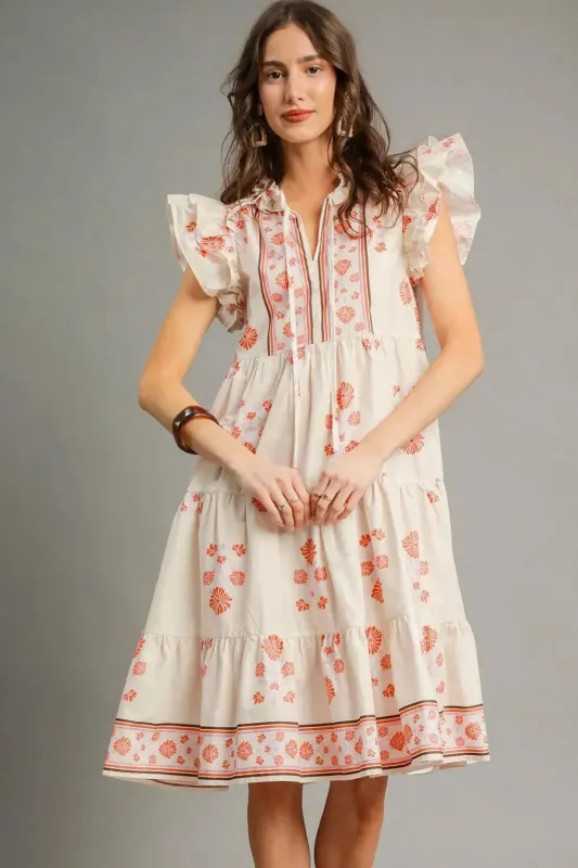 Umgee Printed Tie Neck Ruffle Cap Sleeve Dress sold by Charming Charlie