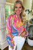 Abstract Print Ruffled Sleeve Buttoned Blouse sold by Charming Charlie