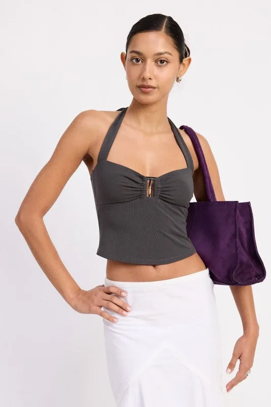 HALTER TIE BACK KNIT TOP WITH FRONT CUTOUT sold by Charming Charlie