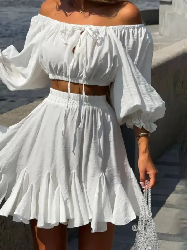 Off-Shoulder Crop Top and Ruffle Skirt Two-Piece Set sold by Charming Charlie