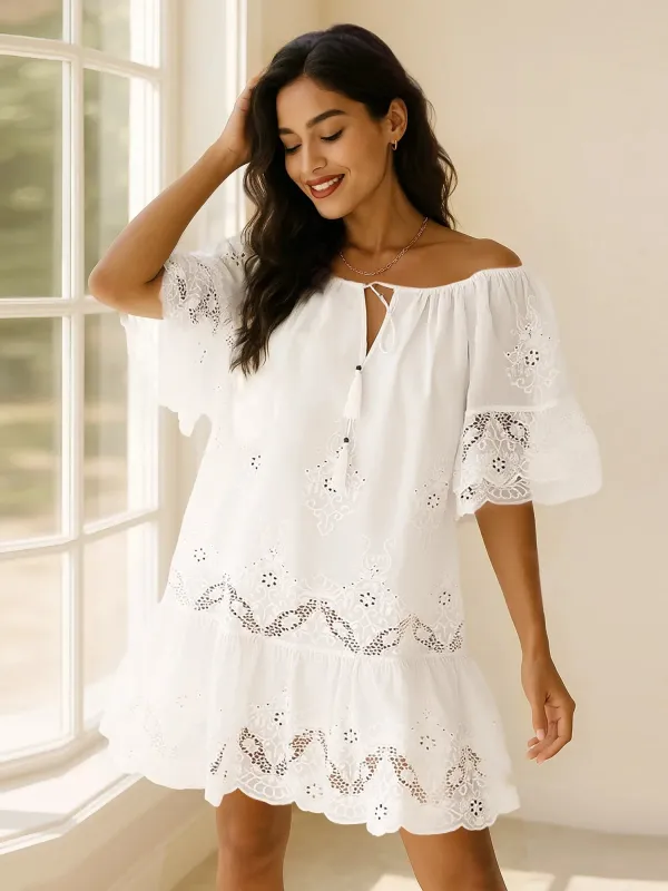 Eyelet Embroidered Tassel Tie Neck Dress sold by Charming Charlie