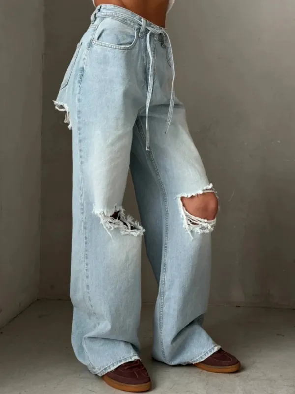 Distressed Wide Leg Jeans sold by Charming Charlie