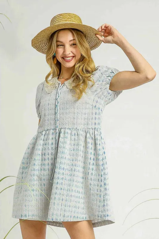 Umgee Lace Detail Short Puff Sleeve Mini Dress sold by Charming Charlie