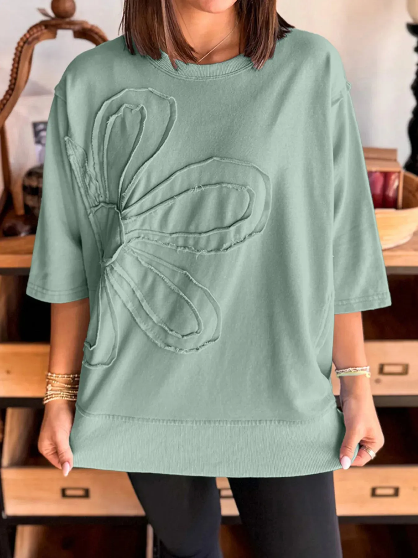Round Neck Oversized T-Shirt sold by Charming Charlie