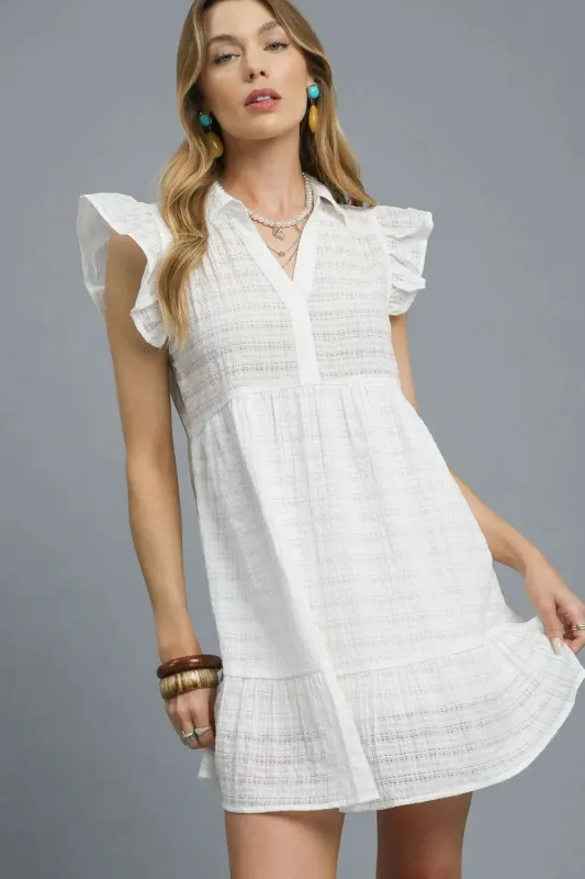 Umgee Ruffle Cap Sleeve Textured Mini Dress sold by Charming Charlie