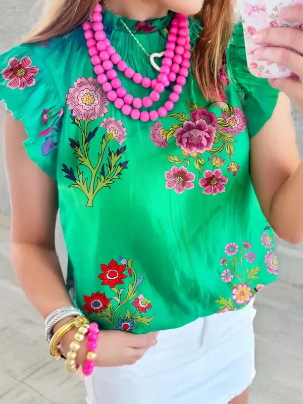 Floral Ruffle Cap Sleeve Blouse sold by Charming Charlie