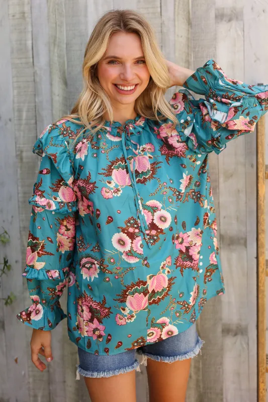 Find Love Aqua Satin Frill Neck Front Tie Ruffle Long Sleeve Blouse sold by Charming Charlie