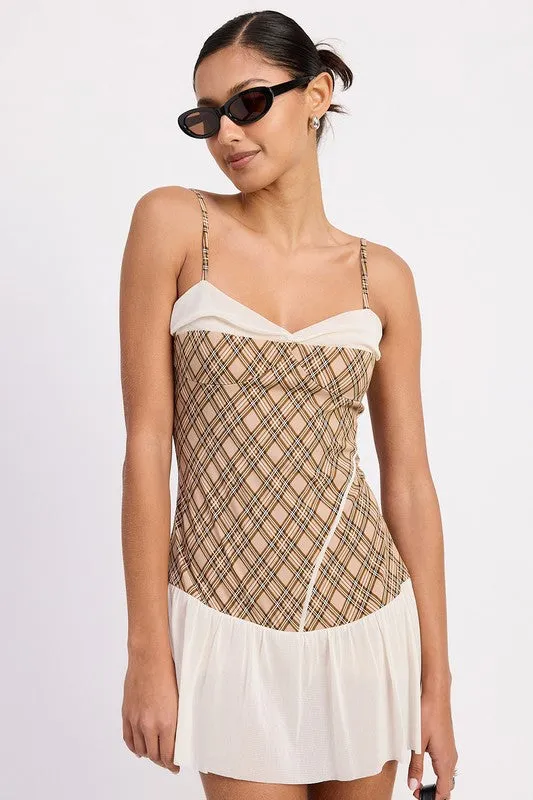 PLAID RUCHED MINI DRESS WITH CONTRAST TRIM sold by Charming Charlie