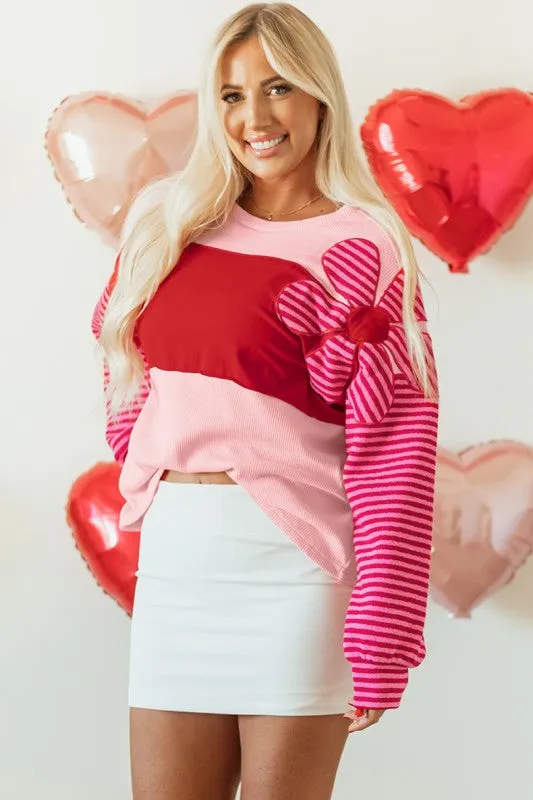 Floral Patch Striped Sleeve Textured Top sold by Charming Charlie